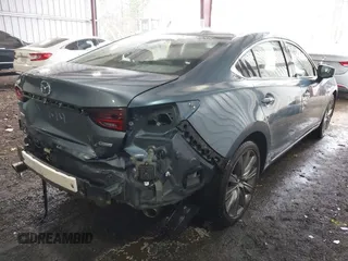 2018 Mazda Mazda6 Touring with VIN JM1GL1VM6J1313332, listed as a IAAI auction lot 41904791 with 71,558 mi miles. Bid and sale history available at carsss.com. Image 4.