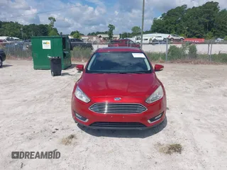 2018 Ford Focus Titanium z VIN 1FADP3J23JL295888, wystawiony jako IAAI lot #42524088 z przebiegiem 108 812 mil mil oraz . Historia ofert i sprzedaży dostępna na DreamBid. Obrazek 12.