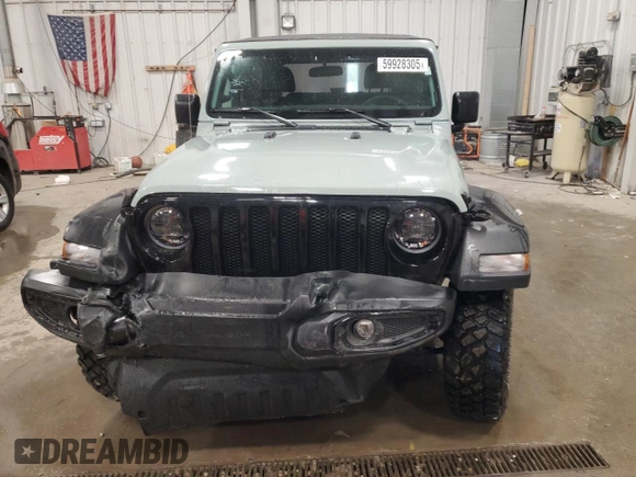 2023 Jeep Wrangler Sport with VIN 1C4HJXAG7PW617021, listed as a Copart auction lot 59928305 with 8,503 mi miles and Salvage title. Bid and sale history available at DreamBid. Image 5.