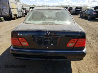 1999 Mercedes-Benz E-Class with VIN WDBJF70H6XA758770, listed as a Copart auction lot 70312094 with 0 mi miles and Salvage Title. Bid and sale history available at carsss.com. Image 6.
