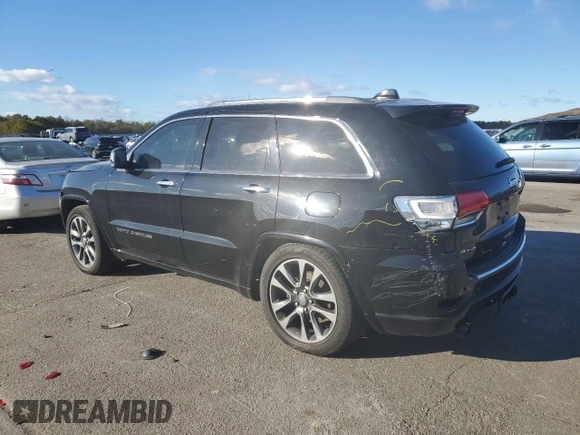 2017 Jeep Grand Cherokee Overland with VIN 1C4RJFCT9HC822898, listed as a Copart auction lot 86567034 with 120,699 mi miles and Salvage Title. Bid and sale history available at carsss.com. Image 2.