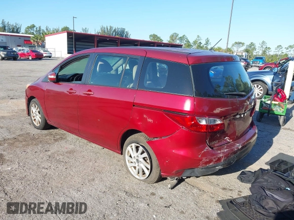 2014 Mazda Mazda5 Sport with VIN JM1CW2BLXE0163650, listed as a IAAI auction lot 42024762 with 137,314 mi miles. Bid and sale history available at carsss.com. Image 3.