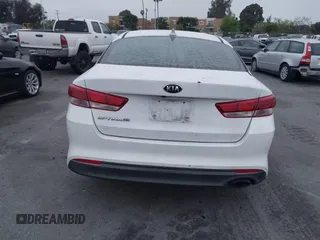 2017 Kia Optima LX with VIN 5XXGT4L37HG151723, listed as a IAAI auction lot 42024328 with 102,257 mi miles and . Bid and sale history available at DreamBid. Image 16.