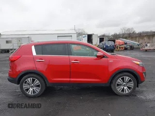 2014 Kia Sportage EX with VIN KNDPCCAC9E7552904, listed as a IAAI auction lot 41980439 with 184,871 mi miles and . Bid and sale history available at DreamBid. Image 13.