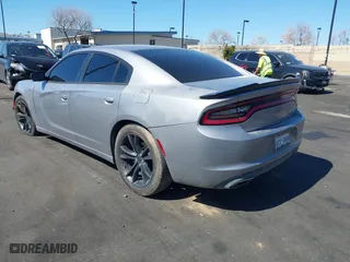 2017 Dodge Charger SE with VIN 2C3CDXBG6HH576448, listed as a IAAI auction lot 41666413 with 173,559 mi miles. Bid and sale history available at carsss.com. Image 3.