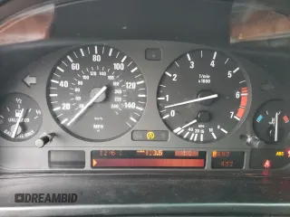 1997 BMW 5 Series 540iA with VIN WBADE6327VBW53064, listed as a Copart auction lot 77033604 with 0 mi miles and Salvage Title. Bid and sale history available at carsss.com. Image 9.