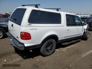 2001 Ford F-150 SuperCrew XLT with VIN 1FTRW08L31KF24186, listed as a Copart auction lot 65188904 with 0 mi miles and Salvage Title. Bid and sale history available at carsss.com. Image 3.