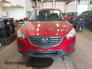 2016 Mazda CX-5 Sport z VIN JM3KE2BY3G0684861, wystawiony jako IAAI lot #42050897 z przebiegiem 165 688 mil mil oraz . Historia ofert i sprzedaży dostępna na DreamBid. Obrazek 13.