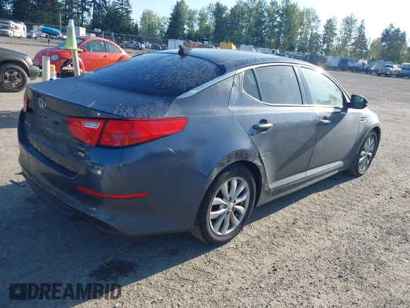 2015 Kia Optima EX with VIN 5XXGN4A77FG368704, listed as a IAAI auction lot 42174674 with 128,963 mi miles. Bid and sale history available at carsss.com. Image 4.