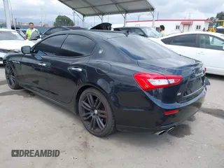 2014 Maserati Ghibli S Q4 with VIN ZAM57RTA0E1101059, listed as a IAAI auction lot 42121292 with 107,901 mi miles and . Bid and sale history available at DreamBid. Image 3.