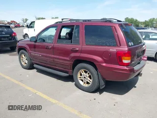 1999 Jeep Grand Cherokee Limited with VIN 1J4GW68S9XC653855, listed as a IAAI auction lot 42433370 with 275,724 mi miles and . Bid and sale history available at DreamBid. Image 3.
