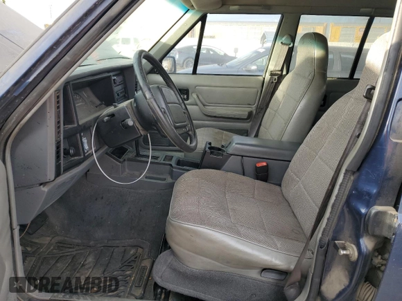 1996 Jeep Cherokee Sport with VIN 1J4FT68S4TL333342, listed as a Copart auction lot 41664965 with 185,199 mi miles and Clean Title. Bid and sale history available at carsss.com. Image 7.