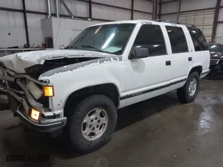 1996 Chevrolet Tahoe with VIN 1GNEK13R5TJ341299, listed as a IAAI auction lot 41713489 with 251,990 mi miles. Bid and sale history available at carsss.com. Image 19.