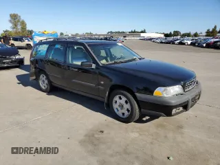 2000 Volvo V70 with VIN YV1LZ56D6Y2654862, listed as a Copart auction lot 74829664 with 0 mi miles and Salvage Title. Bid and sale history available at carsss.com. Image 4.