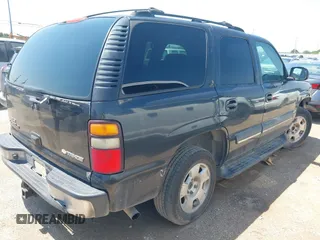 2004 Chevrolet Tahoe LS with VIN 1GNEC13T04R156427, listed as a IAAI auction lot 42333312 with 303,040 mi miles and . Bid and sale history available at DreamBid. Image 4.
