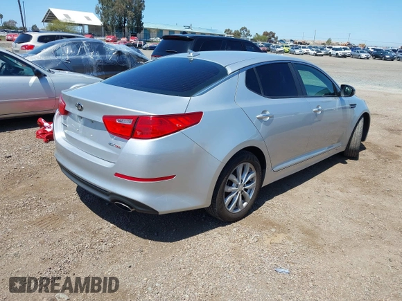 2015 Kia Optima EX with VIN 5XXGN4A73FG436223, listed as a IAAI auction lot 41970418 with 174,002 mi miles. Bid and sale history available at carsss.com. Image 4.