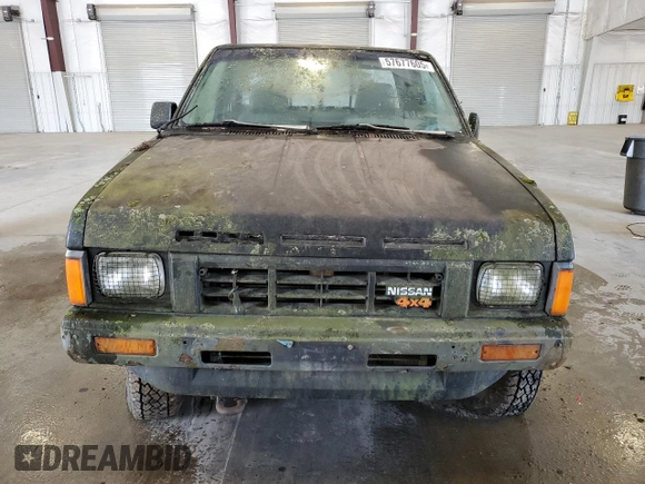 1986 Nissan Hardbody E z VIN 1N6ND16Y7GC413942, wystawiony jako Copart lot #57677605 z przebiegiem 126 183 mil mil oraz Tytuł czysty. Historia ofert i sprzedaży dostępna na DreamBid. Obrazek 5.