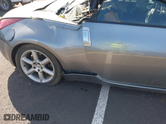 2004 Nissan 350Z Touring with VIN JN1AZ36AX4T011302, listed as a IAAI auction lot 41868504 with 78,683 mi miles. Bid and sale history available at carsss.com. Image 13.