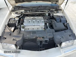 2000 Cadillac Eldorado z VIN 1G6EL12Y0YB704658, wystawiony jako Copart lot #77596814 z przebiegiem Nie podano mil oraz Nie do naprawy • Non repairable. Historia ofert i sprzedaży dostępna na DreamBid. Obrazek 11.