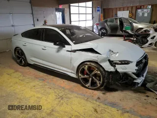 2023 Audi RS 5 Sportback z VIN WUAAWCF5XPA901858, wystawiony jako Copart lot #42140035 z przebiegiem Nie podano mil oraz Szkoda całkowita • Salvage title. Historia ofert i sprzedaży dostępna na DreamBid. Obrazek 4.