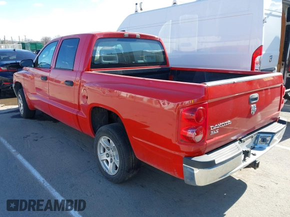 2005 Dodge Dakota SLT z VIN 1D7HE48K85S297456, wystawiony jako IAAI lot #41813718 z przebiegiem 192 229 mil mil oraz . Historia ofert i sprzedaży dostępna na DreamBid. Obrazek 3.