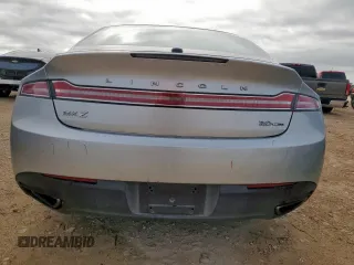 2014 Lincoln MKZ z VIN 3LN6L2G90ER815819, wystawiony jako Copart lot #61189515 z przebiegiem 101 148 mil mil oraz Szkoda całkowita • Salvage title. Historia ofert i sprzedaży dostępna na DreamBid. Obrazek 6.