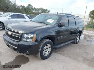 2010 Chevrolet Suburban LS with VIN 1GNUKHE38AR190423, listed as a IAAI auction lot 41655080 with 215,187 mi miles. Bid and sale history available at carsss.com. Image 2.