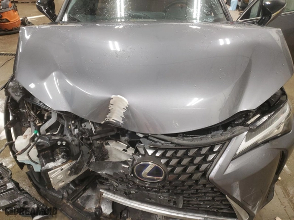 2021 Lexus UX with VIN JTHX9JBH8M2047296, listed as a Copart auction lot 87916535 with 10,297 mi miles and Salvage Title. Bid and sale history available at carsss.com. Image 13.