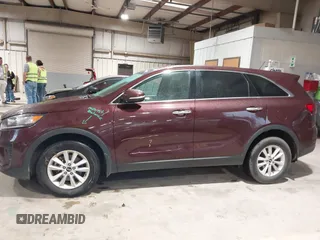 2019 Kia Sorento L with VIN 5XYPG4A34KG548624, listed as a IAAI auction lot 42020831 with 124,226 mi miles. Bid and sale history available at carsss.com. Image 14.