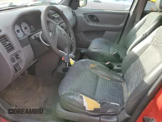 2002 Ford Escape XLS Value with VIN 1FMYU01B82KC15443, listed as a Copart auction lot 77998164 with 212,313 mi miles and Salvage title. Bid and sale history available at DreamBid. Image 7.