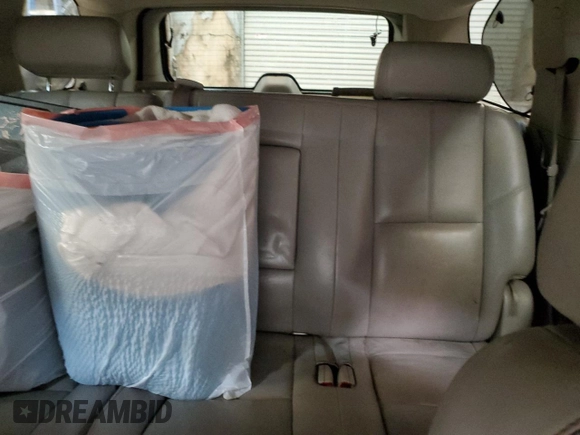 2007 Chevrolet Tahoe LTZ z VIN 1GNFK13087R400634, wystawiony jako Copart lot #57178075 z przebiegiem 174 629 mil mil oraz Czysty tytuł • Clean title. Historia ofert i sprzedaży dostępna na DreamBid. Obrazek 10.
