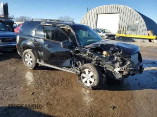 2010 Mercury Mariner с VIN 4M2CN8BG2AKJ19773, выставлен на аукционе Copart как лот 88138555 с пробегом Не указан миль и Списание • Salvage title. История ставок и продаж доступна на DreamBid. Изображение 4.