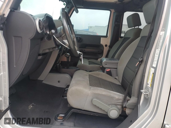 2010 Jeep Wrangler Unlimited Sahara with VIN 1J4BA5H17AL117410, listed as a Copart auction lot 88519555 with 126,471 mi miles and Salvage Title. Bid and sale history available at carsss.com. Image 7.