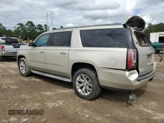 2015 GMC Yukon XL SLT with VIN 1GKS1HKC5FR168608, listed as a Copart auction lot 71564384 with 197,538 mi miles and Salvage Title. Bid and sale history available at carsss.com. Image 2.