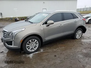 2019 Cadillac XT5 AWD z VIN 1GYKNBRS1KZ190393, wystawiony jako Copart lot #86189504 z przebiegiem 69 988 mil mil oraz Czysty tytuł • Clean title. Historia ofert i sprzedaży dostępna na DreamBid. Obrazek 1.