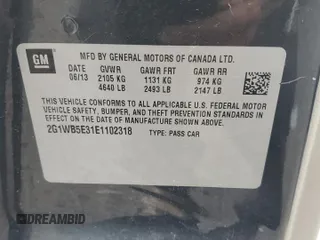 2014 Chevrolet Impala LT z VIN 2G1WB5E31E1102318, wystawiony jako Copart lot #61552845 z przebiegiem 191 365 mil mil oraz Szkoda całkowita • Salvage title. Historia ofert i sprzedaży dostępna na DreamBid. Obrazek 13.