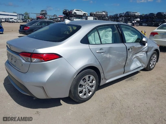 2021 Toyota Corolla LE with VIN JTDEPMAE0MJ119069, listed as a IAAI auction lot 41847095 with 51,561 mi miles. Bid and sale history available at carsss.com. Image 4.