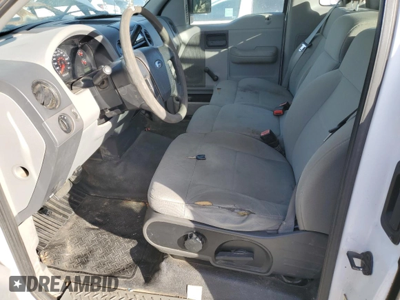 2008 Ford F-150 XL with VIN 1FTRF12238KE06557, listed as a Copart auction lot 87107984 with 192,617 mi miles and Salvage title. Bid and sale history available at DreamBid. Image 7.