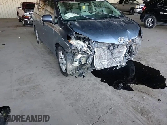 2014 Toyota Sienna LE AAS with VIN 5TDKK3DC3ES406304, listed as a Copart auction lot 54184135 with 164,658 mi miles and Salvage Title. Bid and sale history available at DreamBid. Image 14.