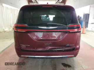 2021 Chrysler Pacifica Hybrid Touring L with VIN 2C4RC1L77MR596250, listed as a Copart auction lot 52892595 with 114,876 mi miles and Salvage title. Bid and sale history available at DreamBid. Image 6.