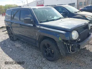 2015 Jeep Patriot Altitude Edition with VIN 1C4NJPBA8FD328401, listed as a IAAI auction lot 41952061 with 134,026 mi miles. Bid and sale history available at carsss.com. Image 1.