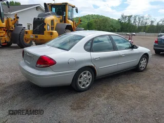 2005 Ford Taurus SE z VIN 1FAFP53U25A251787, wystawiony jako IAAI lot #42233901 z przebiegiem 141 347 mil mil oraz . Historia ofert i sprzedaży dostępna na DreamBid. Obrazek 4.
