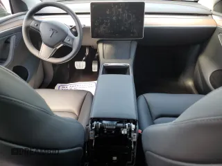 2023 Tesla Model Y Performance z VIN 7SAYGDEFXPF948763, wystawiony jako Copart lot #50562134 z przebiegiem 948 mil mil oraz Szkoda całkowita • Salvage title. Historia ofert i sprzedaży dostępna na DreamBid. Obrazek 8.