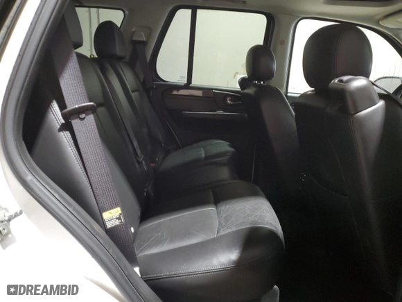 2005 GMC Envoy SLE with VIN 1GKDT13S452315816, listed as a Copart auction lot 52863805 with 128,922 mi miles and Salvage Title. Bid and sale history available at carsss.com. Image 11.