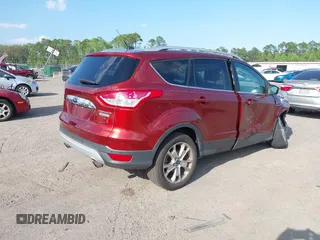2014 Ford Escape Titanium with VIN 1FMCU0JX7EUB96463, listed as a IAAI auction lot 41935190 with 67,098 mi miles. Bid and sale history available at carsss.com. Image 4.