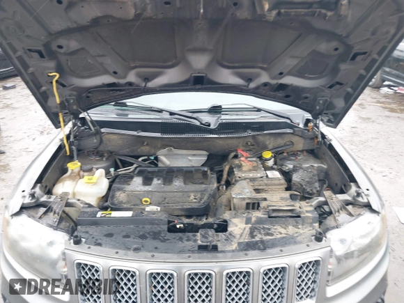 2014 Jeep Compass Latitude with VIN 1C4NJCEB2ED522109, listed as a IAAI auction lot 40282558 with 168,954 mi miles and . Bid and sale history available at carsss.com. Image 10.
