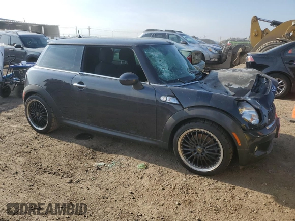 2009 MINI Hardtop S with VIN WMWMF73599TT94509, listed as a Copart auction lot 53495645 with Not provided miles and Salvage title. Bid and sale history available at DreamBid. Image 4.
