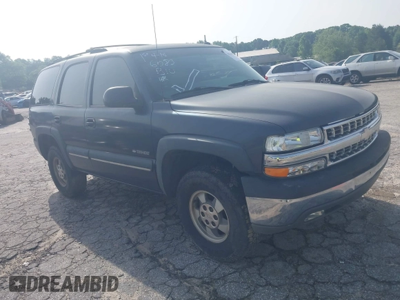2002 Chevrolet Tahoe LS z VIN 1GNEC13ZX2R273935, wystawiony jako IAAI lot #42246472 z przebiegiem 205 995 mil mil oraz . Historia ofert i sprzedaży dostępna na DreamBid. Obrazek 1.