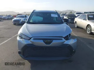 2023 Toyota Corolla Cross Hybrid S with VIN 7MUFBABG8PV011345, listed as a IAAI auction lot 41286619 with 13,518 mi miles and . Bid and sale history available at DreamBid. Image 12.