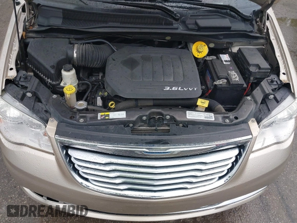 2014 Chrysler Town & Country Touring with VIN 2C4RC1BG7ER208937, listed as a IAAI auction lot 42213347 with 198,077 mi miles and . Bid and sale history available at DreamBid. Image 10.